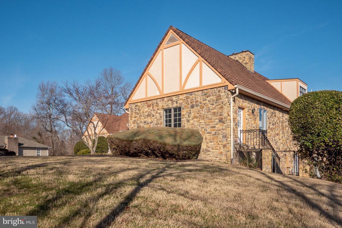 3100 Hemlock Point Court Triangle, VA 22172 - Photo 66 of 71 a front view of a house with a yard