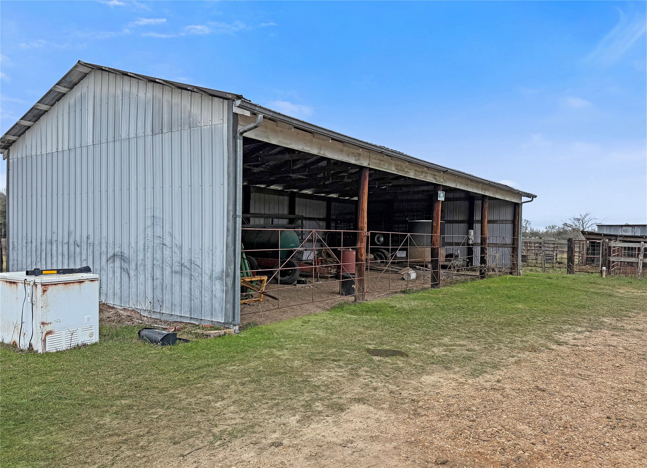 5885 Nickel Mica Road Flatonia, TX 78941 - Photo 12 of 12 a view of a house with backyard and porch