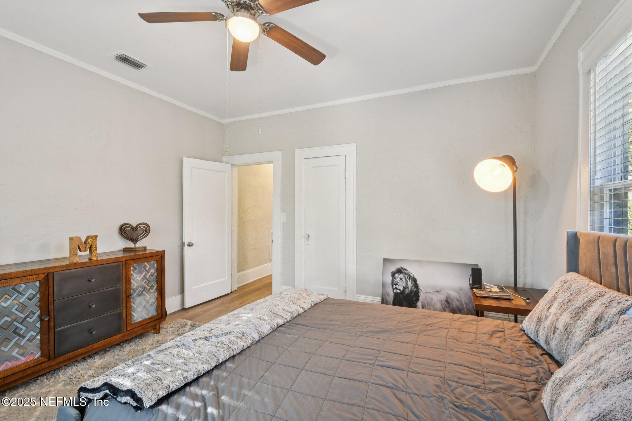 2850 College Street Jacksonville, FL 32205 - Photo 11 of 20 a bedroom with a bed and a dresser