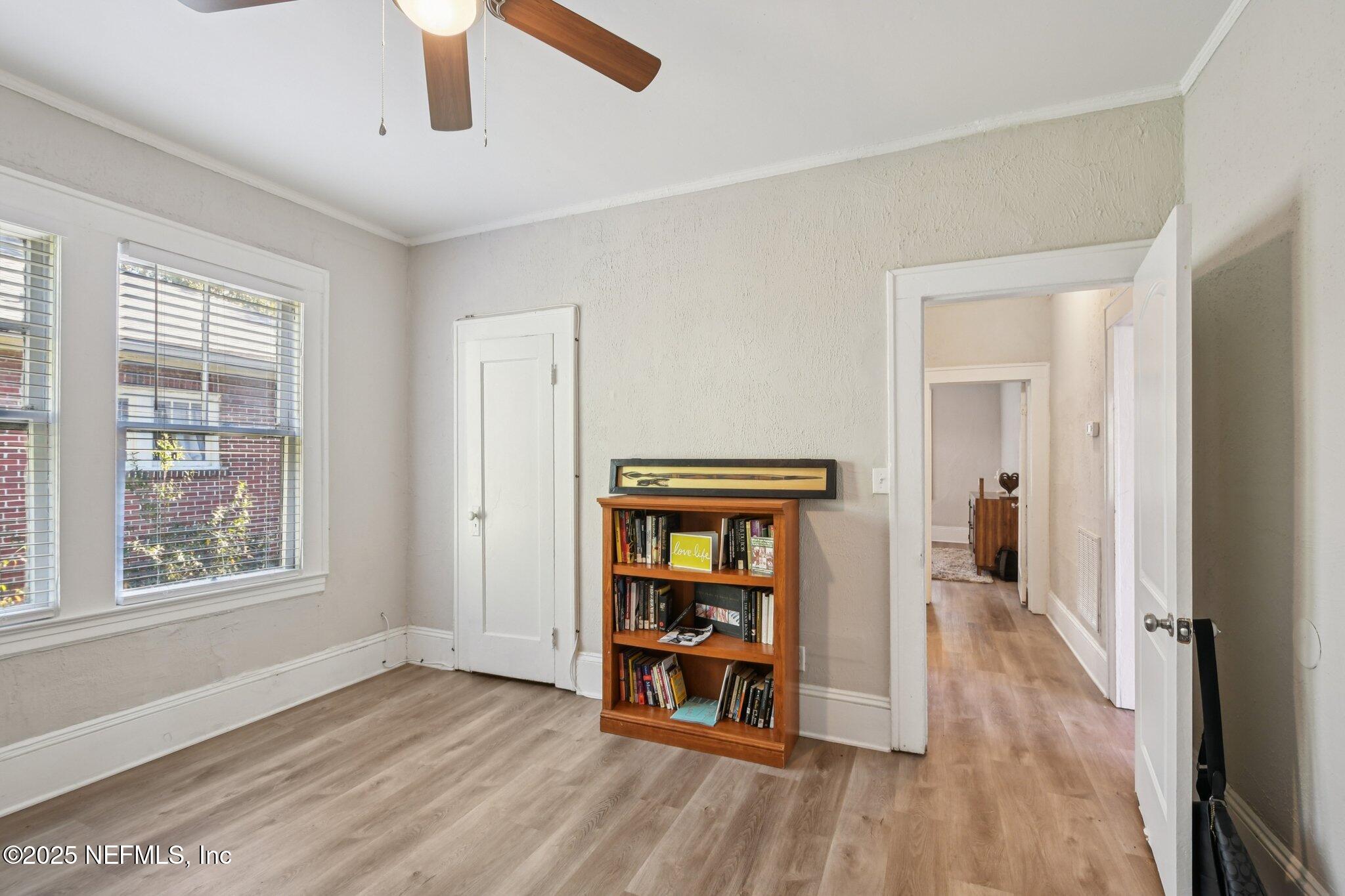 2850 College Street Jacksonville, FL 32205 - Photo 14 of 20 a view of an empty room with window and wooden floor