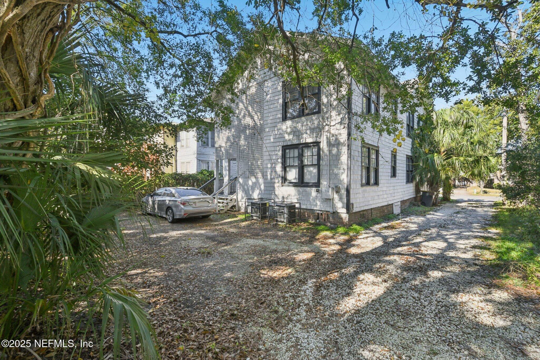 2850 College Street Jacksonville, FL 32205 - Photo 17 of 20 a view of a house with a yard