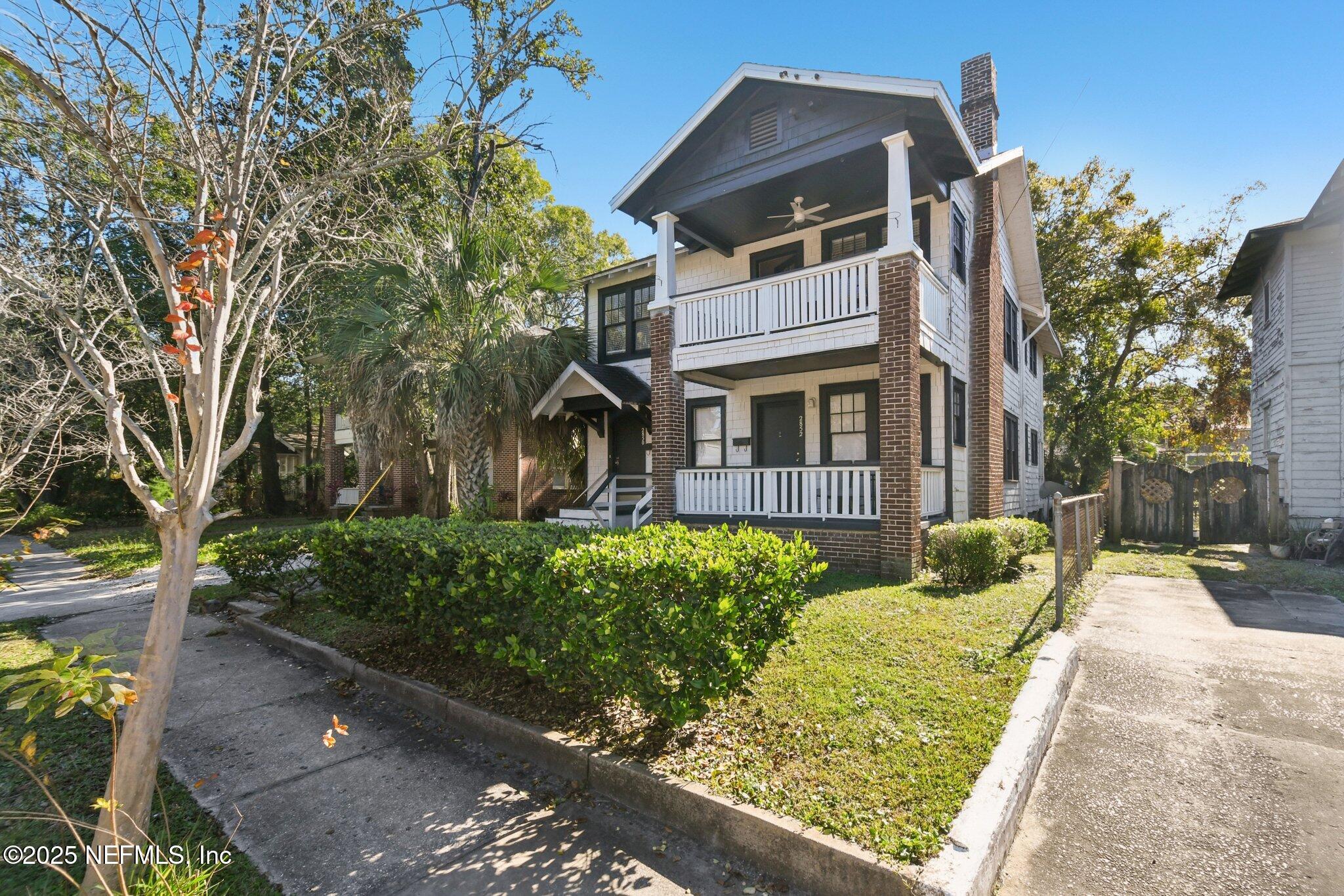 2850 College Street Jacksonville, FL 32205 - Photo 18 of 20 a front view of a house with garden