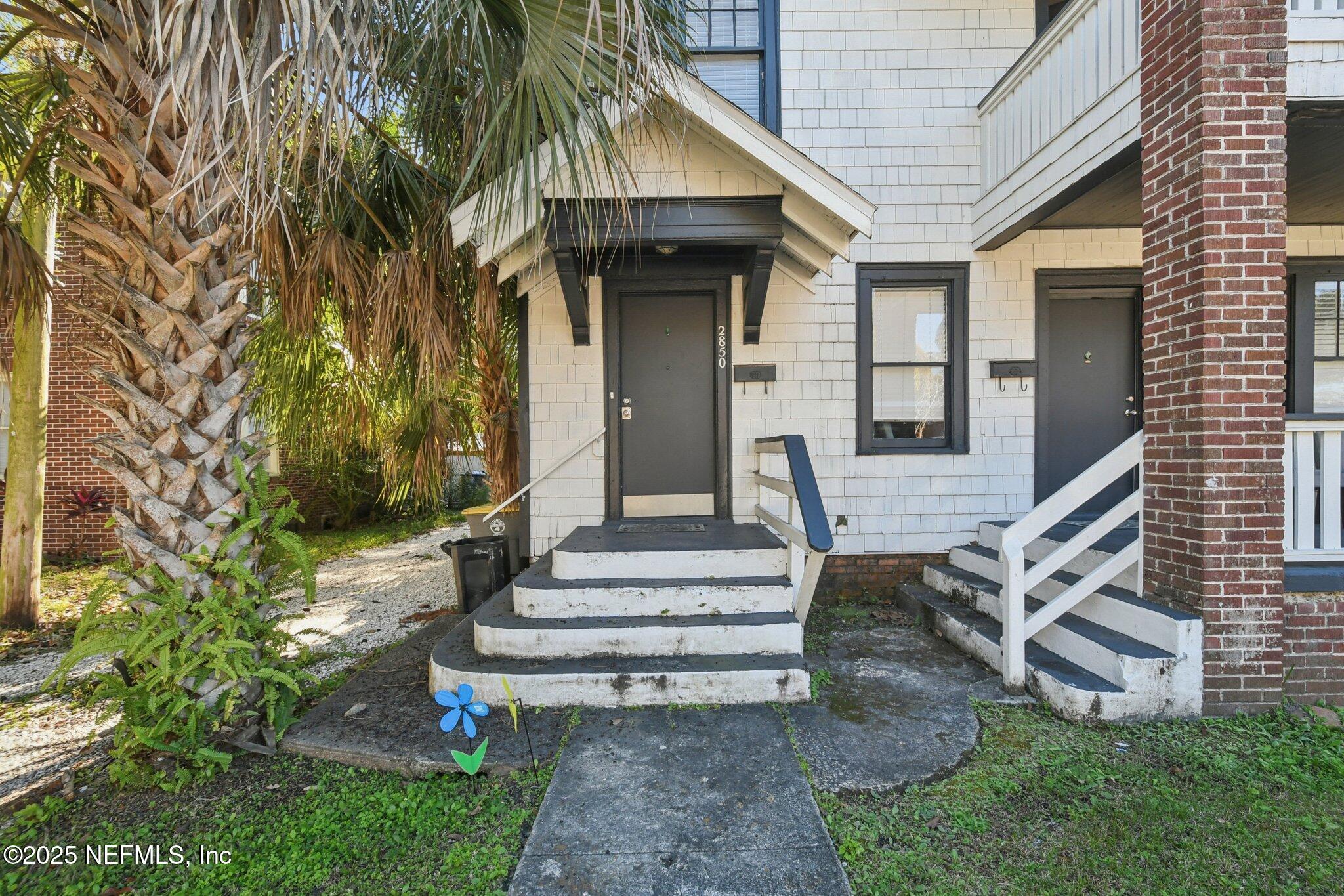 2850 College Street Jacksonville, FL 32205 - Photo 2 of 20 a view of house with wooden bench and floor