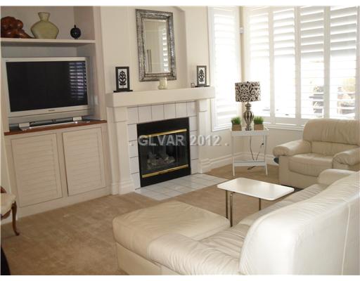 1725 Jack Rabbit Way Las Vegas, NV 89128 - Photo 5 of 17 Den. End of family room with fireplace