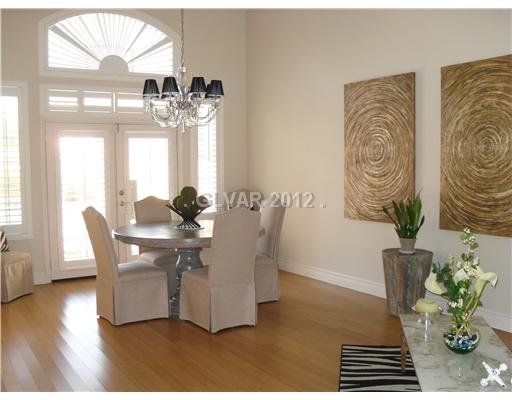1725 Jack Rabbit Way Las Vegas, NV 89128 - Photo 10 of 17 Dining Room. Formal dining with door leading to pool