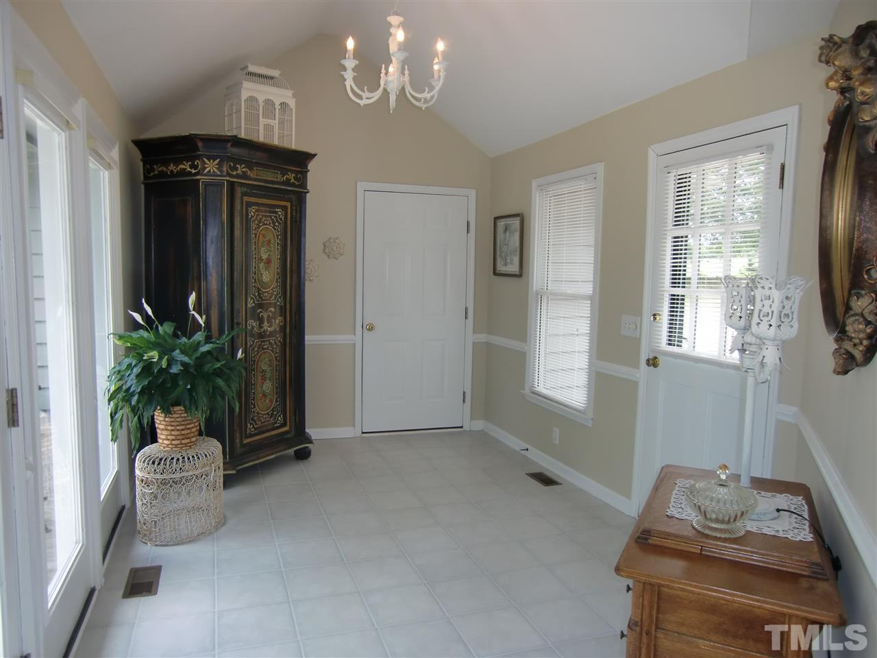 5348 Old Stage Road North Angier, NC 27501 - Photo 20 of 30 Enjoy this room year-round! Access to the Garage & Garden Entries, Lovely view of the Pond and Woodland Animals!