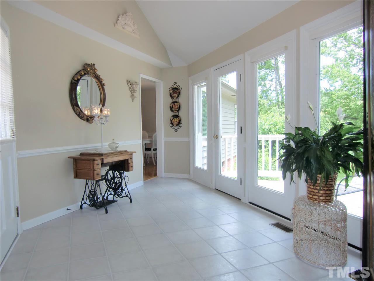 5348 Old Stage Road North Angier, NC 27501 - Photo 21 of 30 Enjoy this room year-round! Access to the Garage & Garden Entries, Lovely view of the Pond and Woodland Animals!