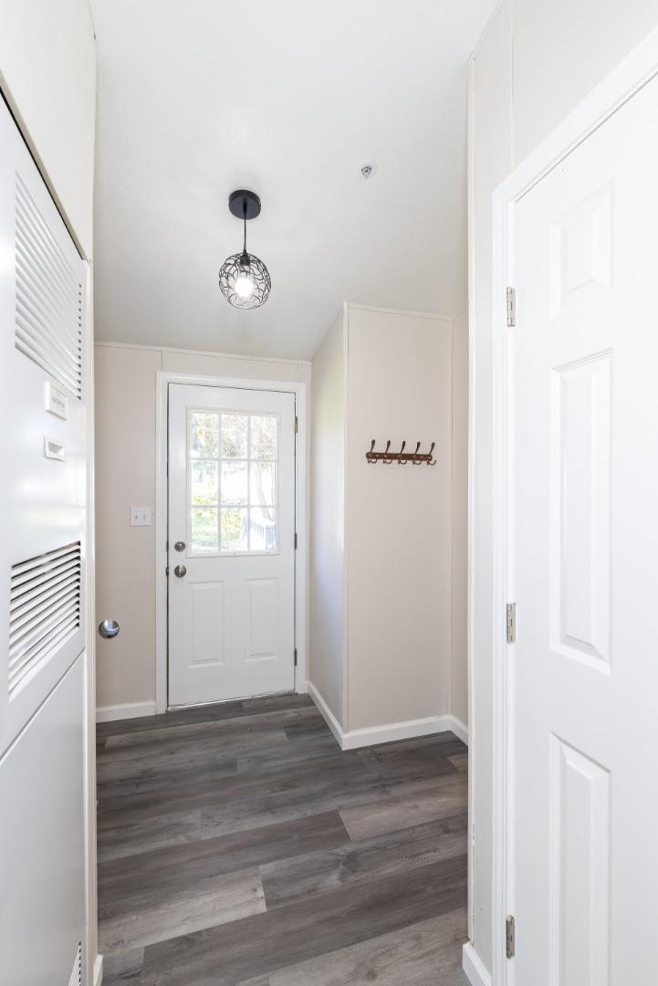 163 Harkins Slough Road Watsonville, CA 95076 - Photo 15 of 21 a view of an entryway with wooden floor