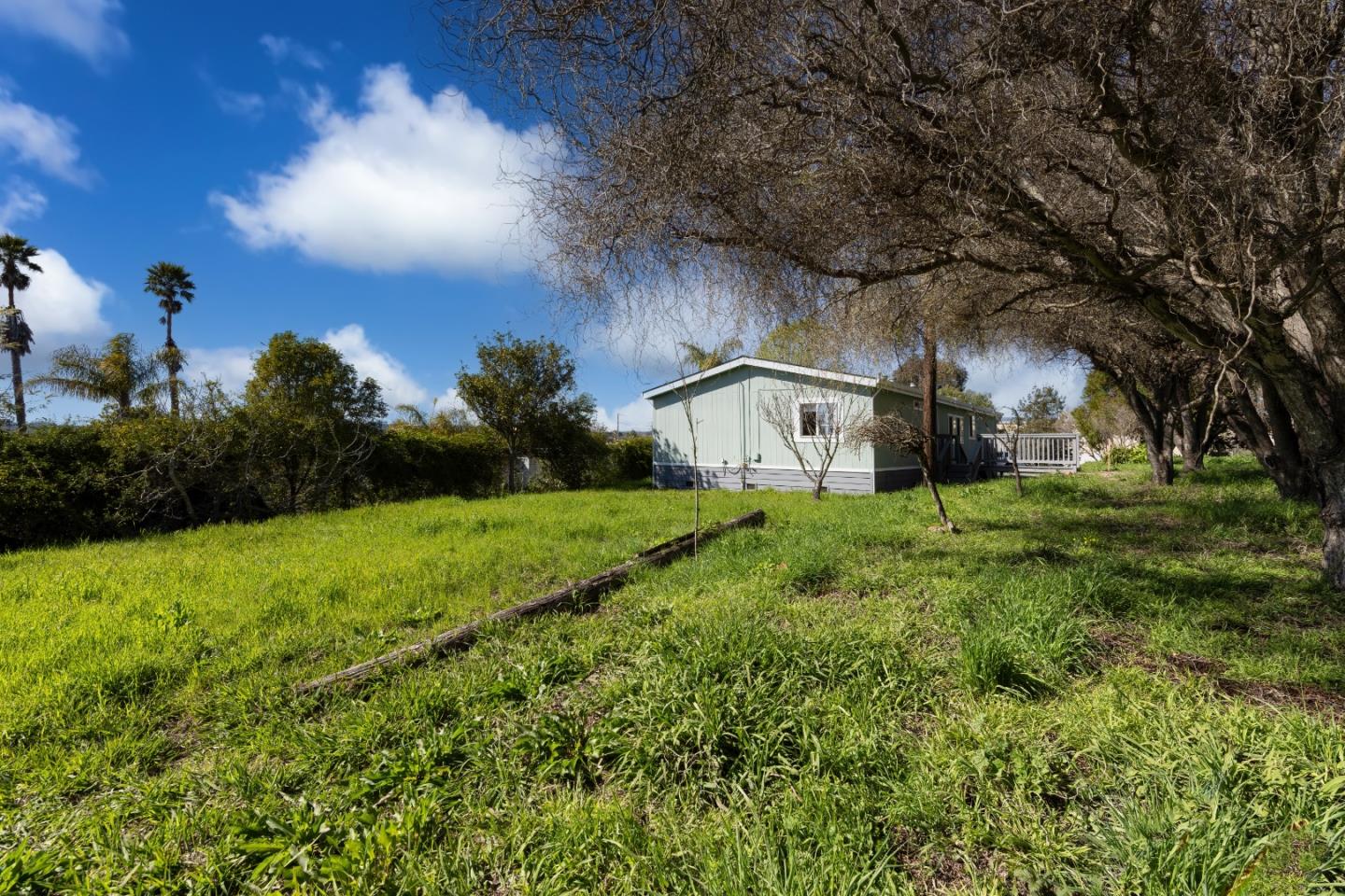 163 Harkins Slough Road Watsonville, CA 95076 - Photo 19 of 21 a front view of a house with garden