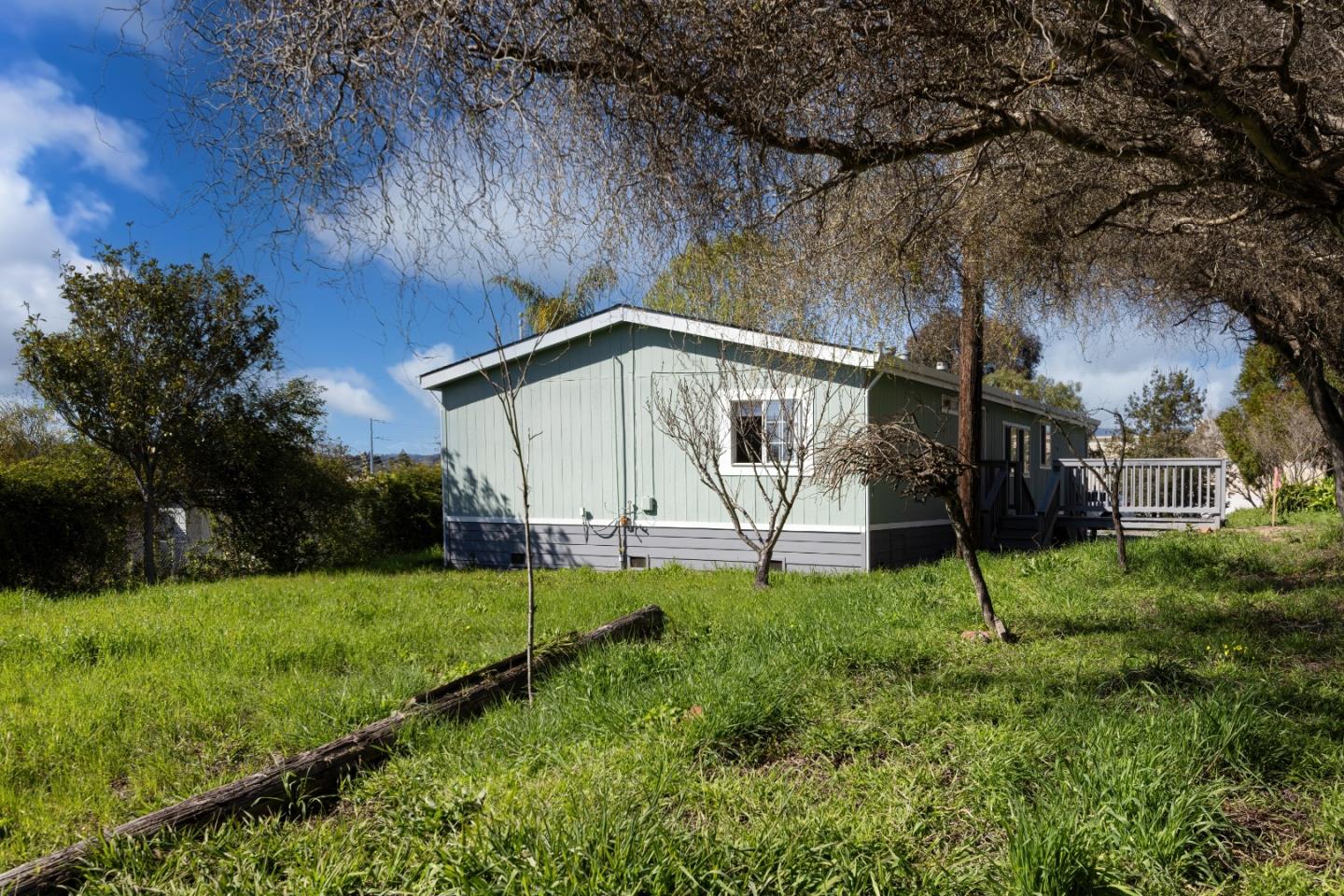 163 Harkins Slough Road Watsonville, CA 95076 - Photo 20 of 21 a view of front of house with a yard