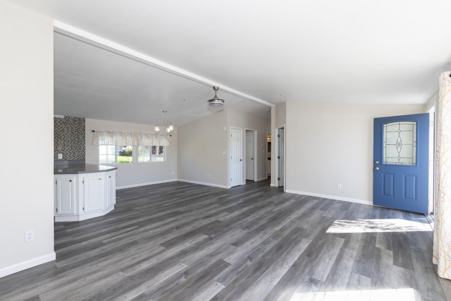 163 Harkins Slough Road Watsonville, CA 95076 - Photo 9 of 21 a view of empty room with wooden floor