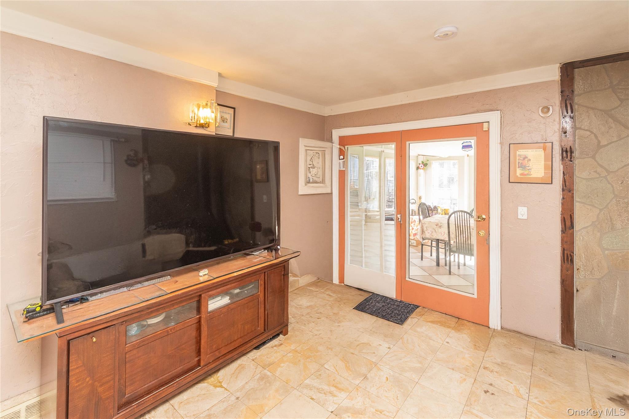 7 Merrick Lane Spring Valley, NY 10977 - Photo 13 of 28 a living room with furniture and a flat screen tv