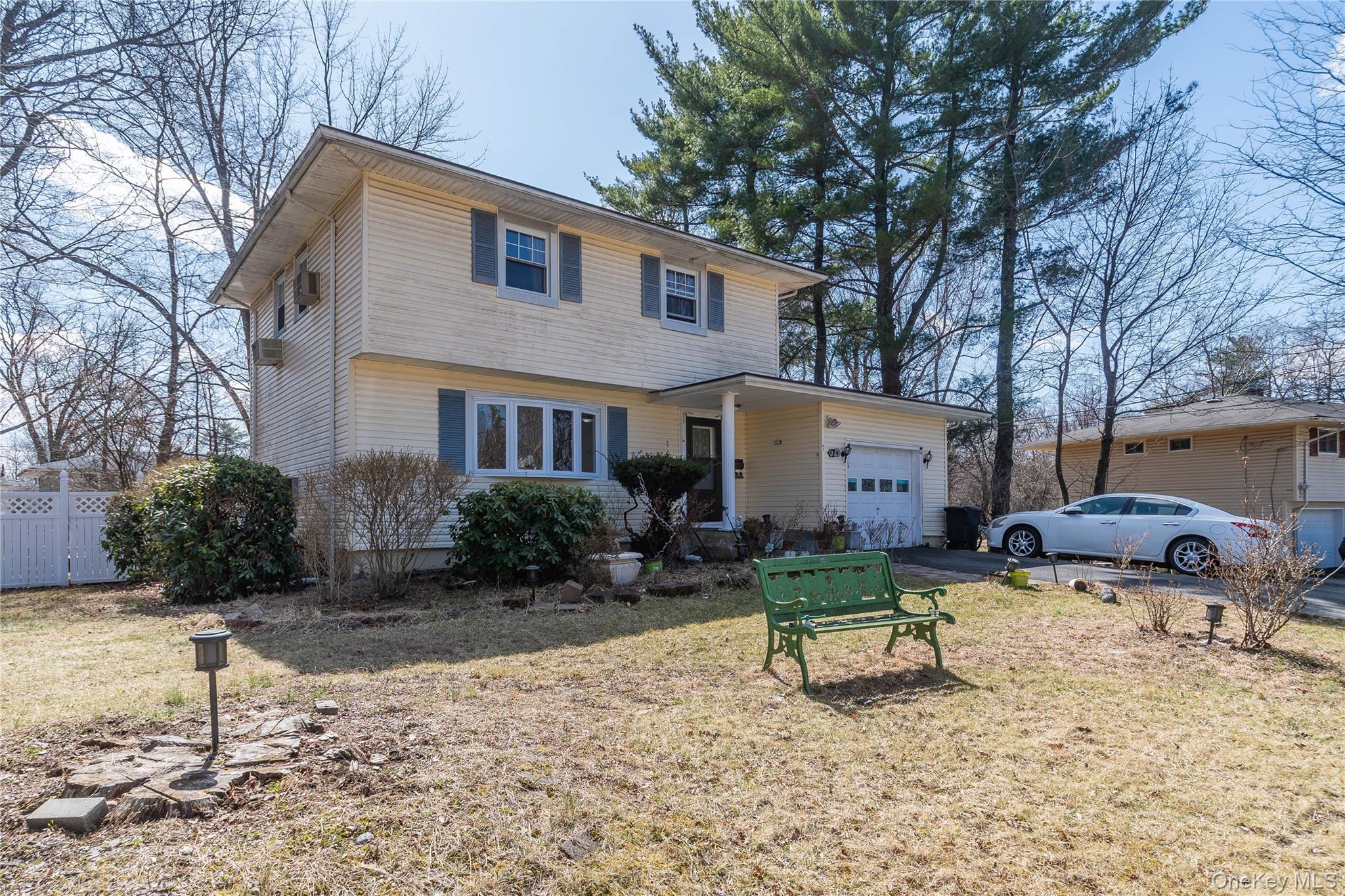 7 Merrick Lane Spring Valley, NY 10977 - Photo 2 of 28 a view of backyard of house with outdoor seating and barbeque oven