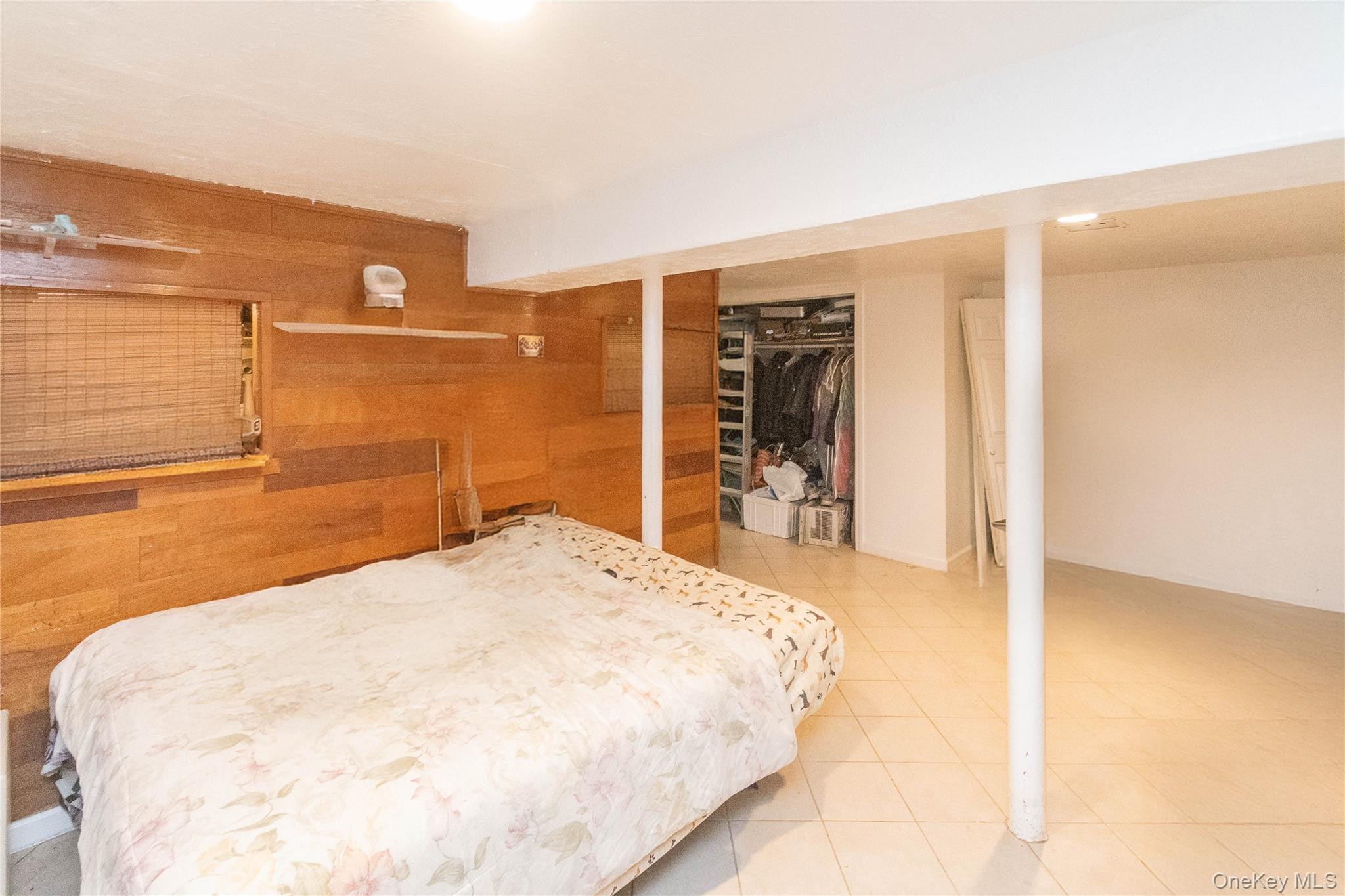 7 Merrick Lane Spring Valley, NY 10977 - Photo 26 of 28 a bathroom with a bathtub and a shower