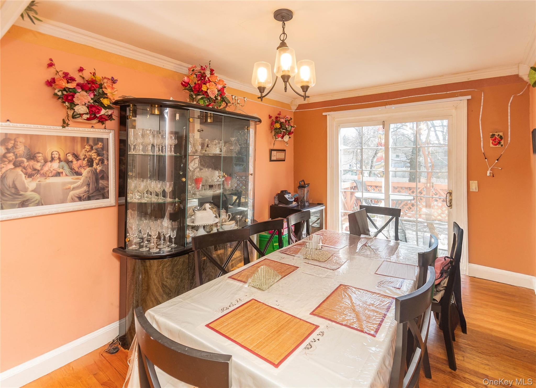 7 Merrick Lane Spring Valley, NY 10977 - Photo 10 of 28 a view of a dining room with furniture window and wooden floor