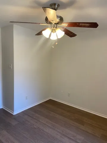 a view of a window in an empty room