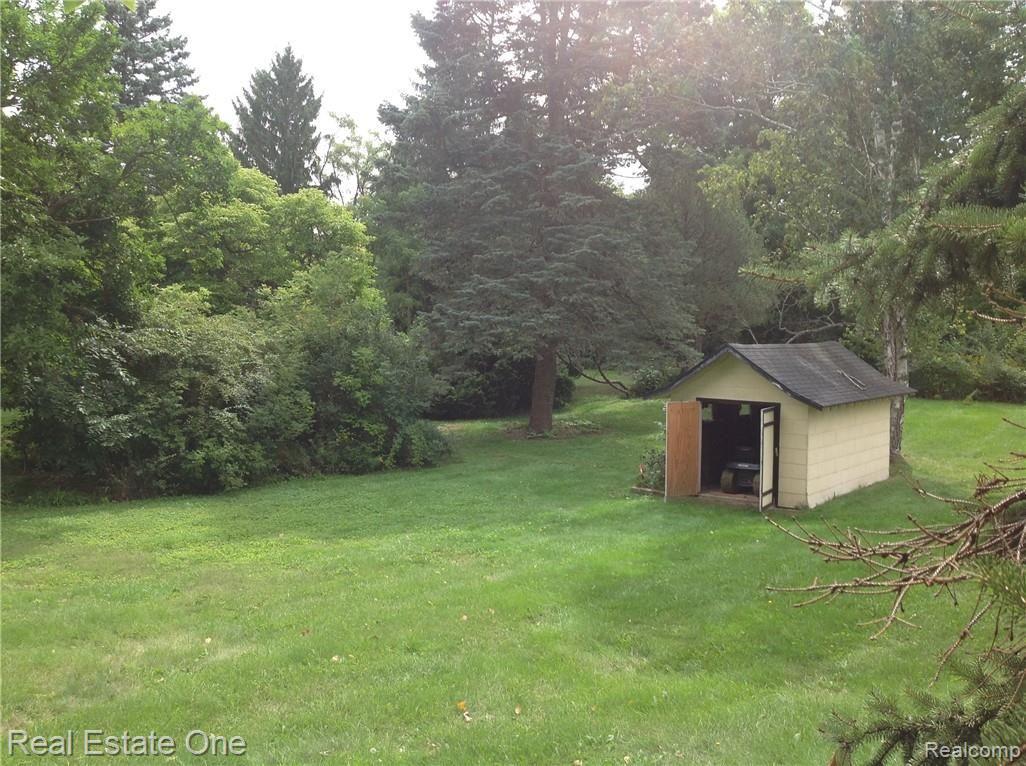 6337 Maybee Road Clarkston, MI 48346 - Photo 18 of 59 Another View Of Awesome Storage Shed With Concrete Slab
