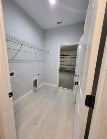 a view of a room with an empty space