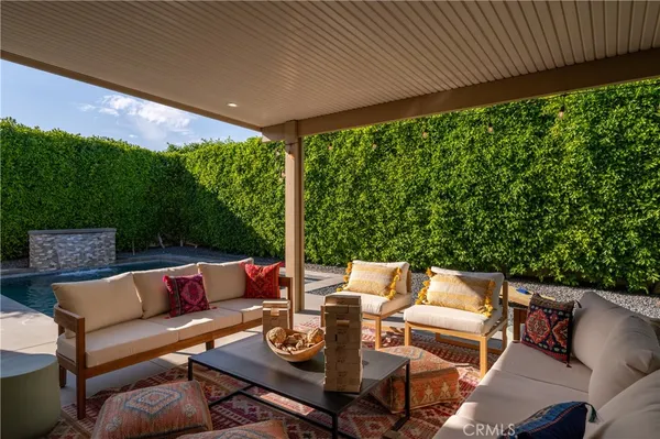 a outdoor living space with furniture and garden view
