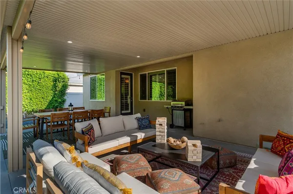 an outdoor space with patio and mountain view