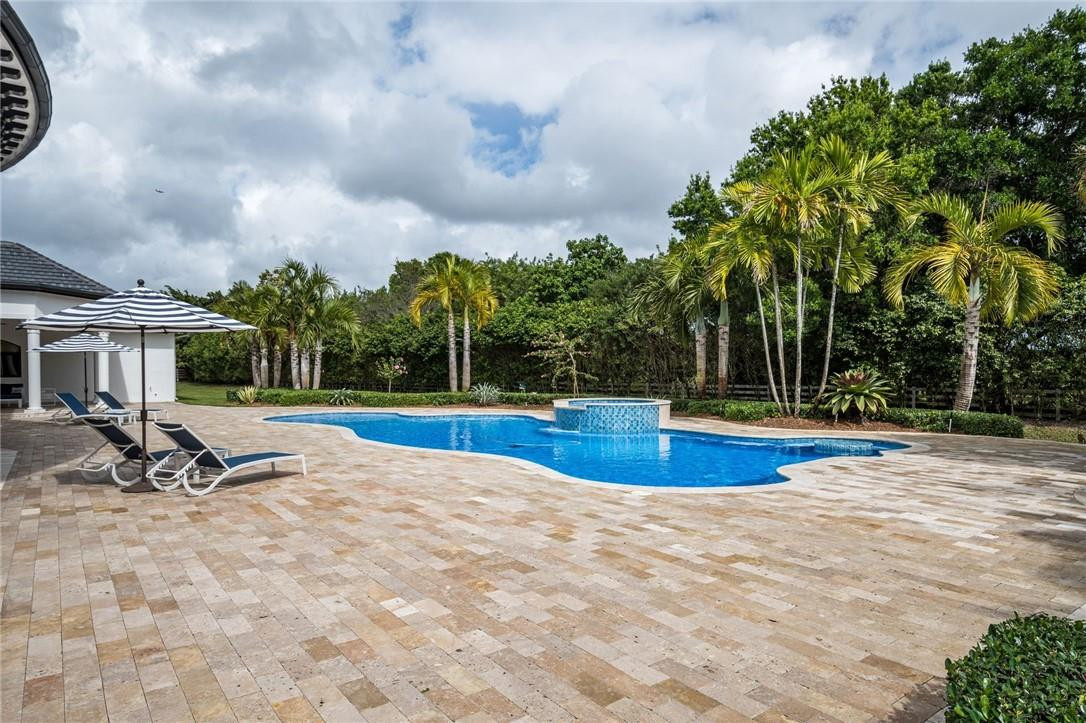 5780 Southwest 128th Avenue Southwest Ranches, FL 33330 - Photo 21 of 80 a view of a house with swimming pool and sitting area