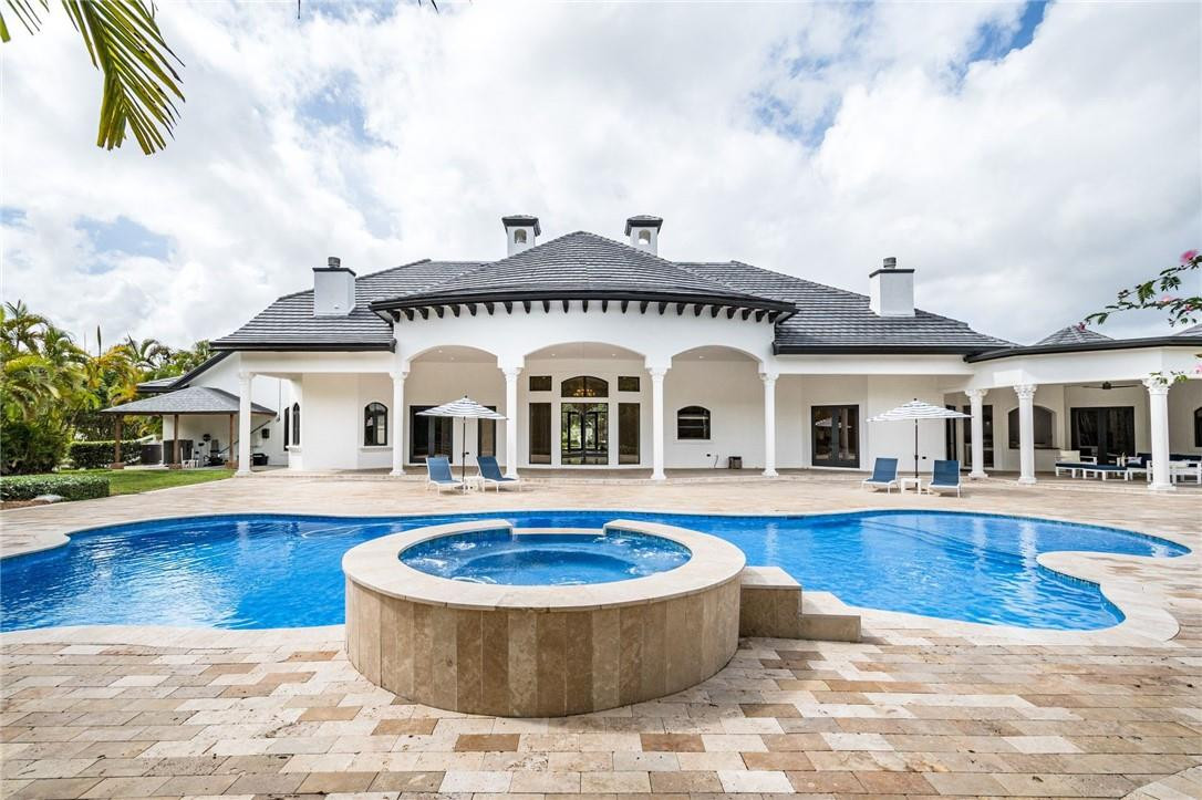 5780 Southwest 128th Avenue Southwest Ranches, FL 33330 - Photo 24 of 80 a front view of house with yard swimming pool and outdoor seating