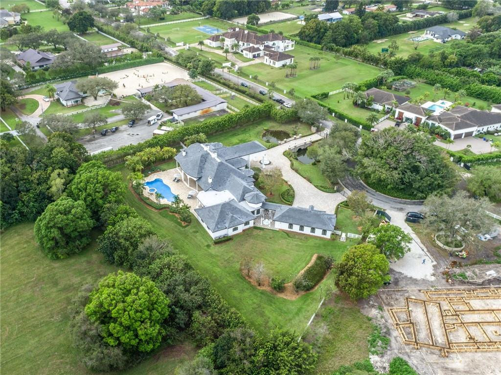 5780 Southwest 128th Avenue Southwest Ranches, FL 33330 - Photo 3 of 80 an aerial view of a house with yard