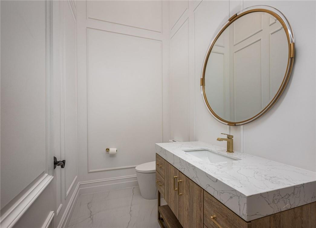 5780 Southwest 128th Avenue Southwest Ranches, FL 33330 - Photo 52 of 80 a bathroom with a sink and a mirror