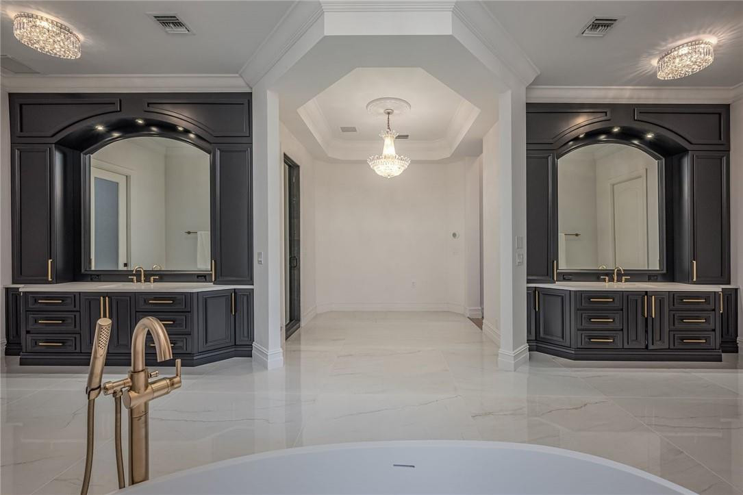 5780 Southwest 128th Avenue Southwest Ranches, FL 33330 - Photo 59 of 80 a bathroom with a sink a mirror and a shower