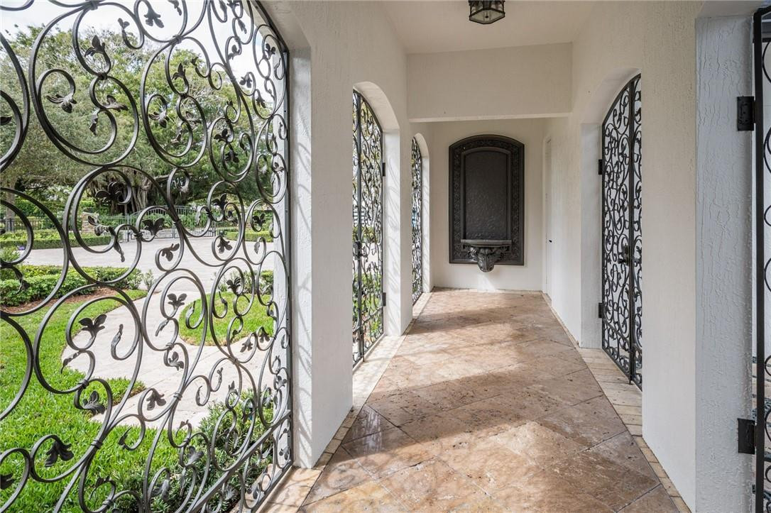 5780 Southwest 128th Avenue Southwest Ranches, FL 33330 - Photo 64 of 80 a view of a entryway door of the house