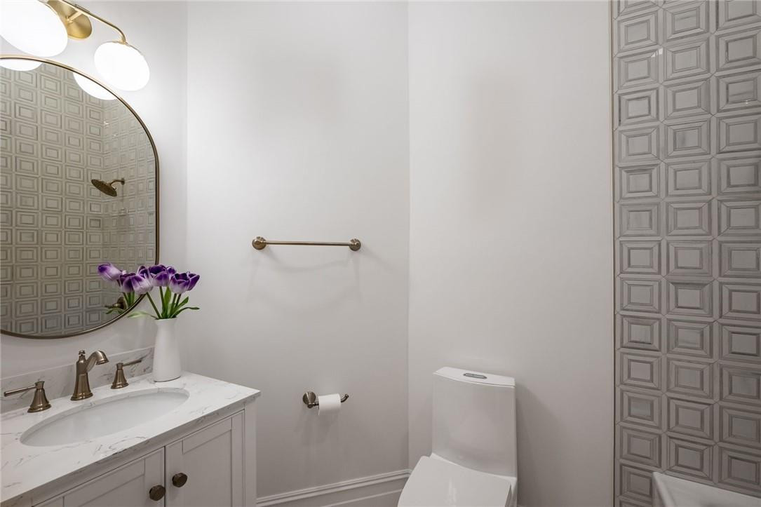 5780 Southwest 128th Avenue Southwest Ranches, FL 33330 - Photo 75 of 80 a bathroom with a sink and mirror with toilet