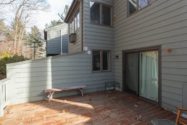 a view of house with backyard