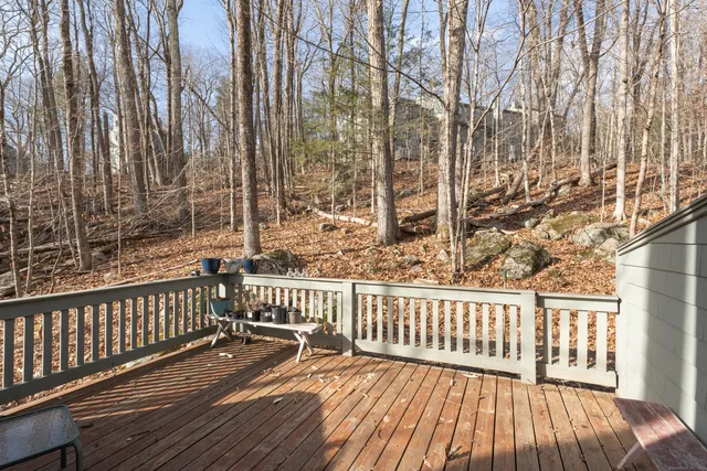 a view of a wooden roof with wooden fence