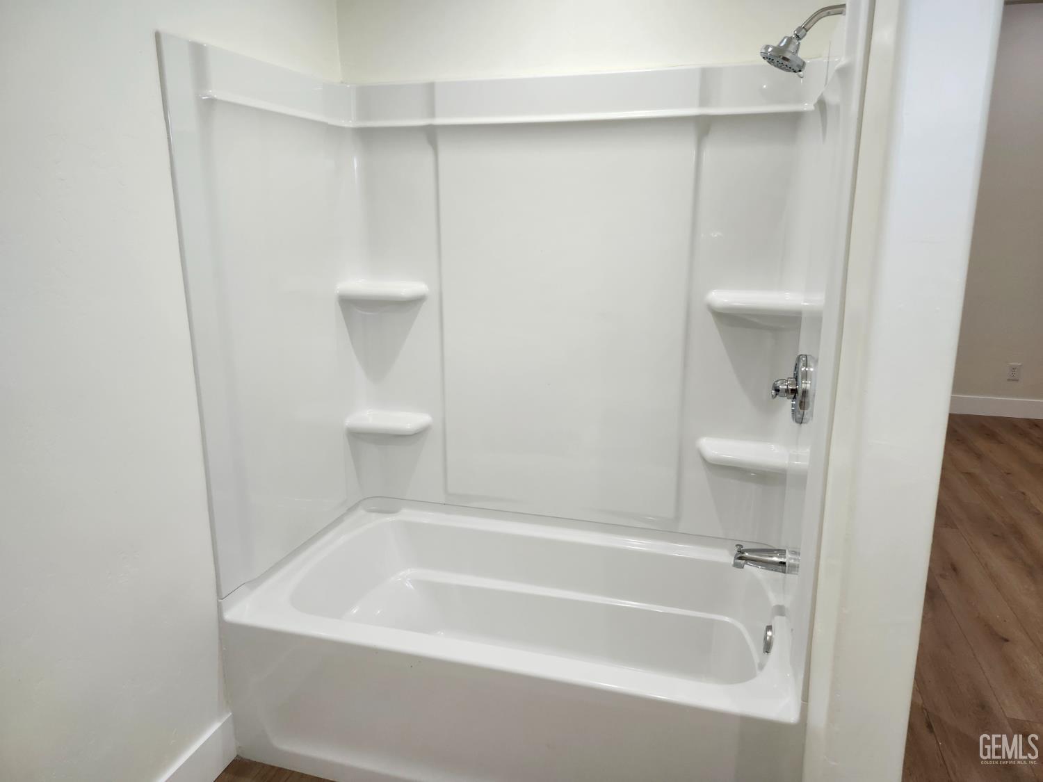 Undisclosed Address Delano, CA 93215 - Photo 20 of 33 a bathroom with a bathtub