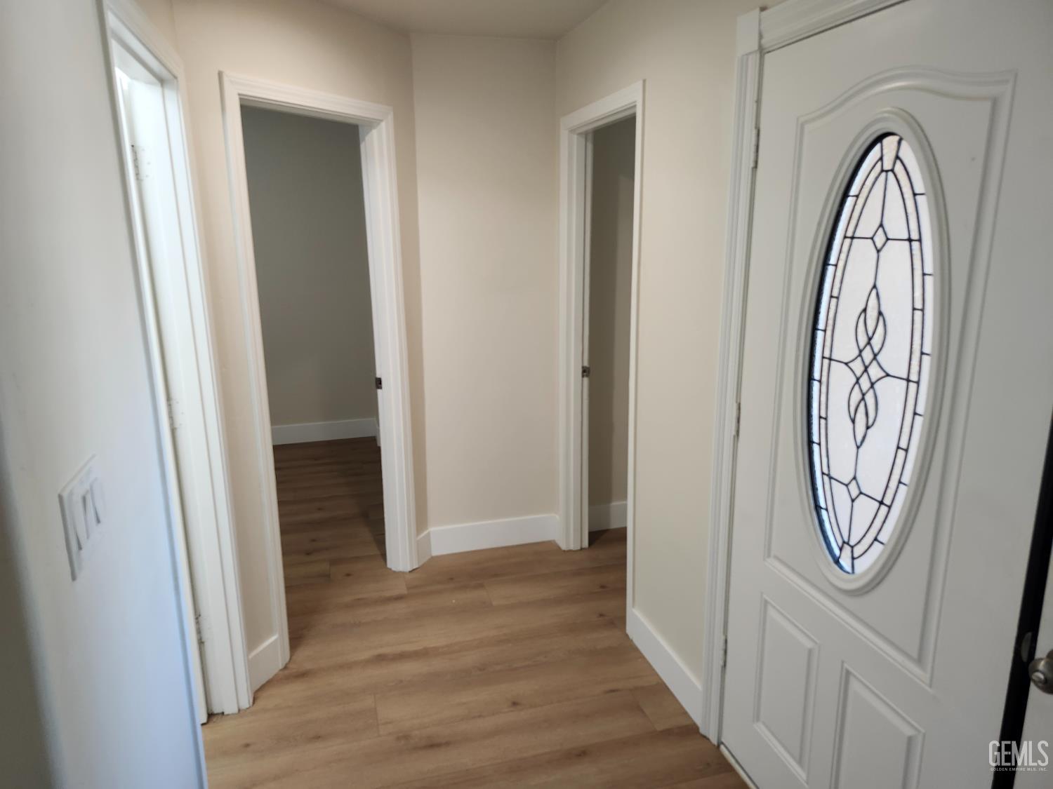 Undisclosed Address Delano, CA 93215 - Photo 23 of 33 a view of a hallway with wooden door
