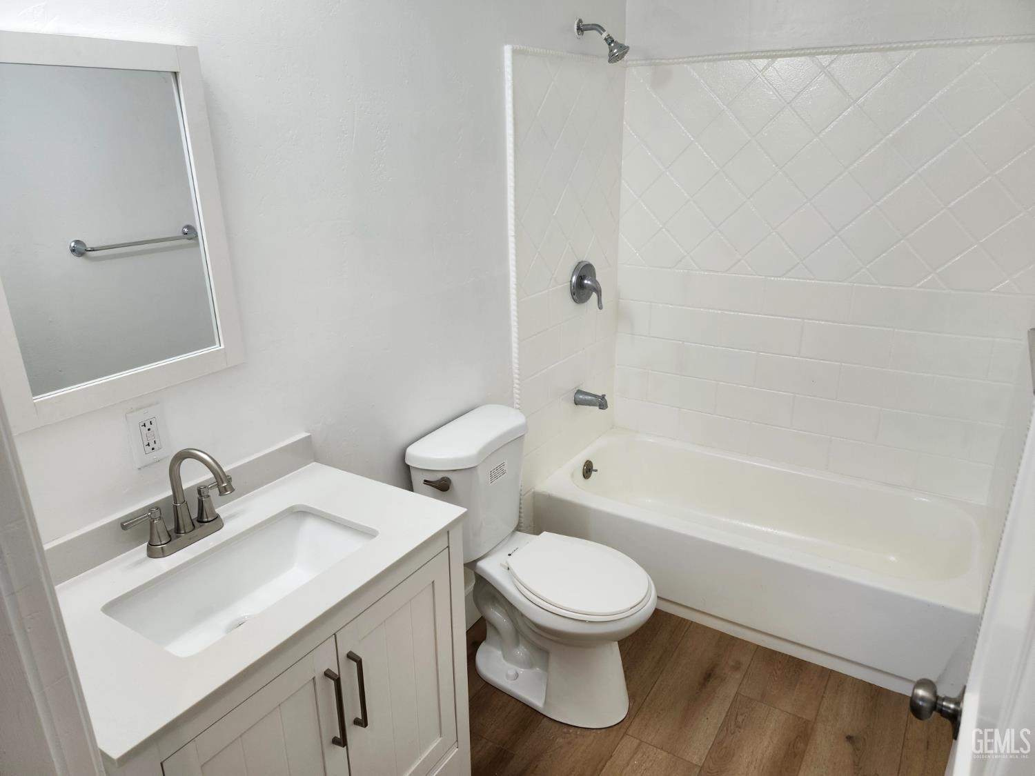 Undisclosed Address Delano, CA 93215 - Photo 24 of 33 a white toilet sitting next to a bathroom sink