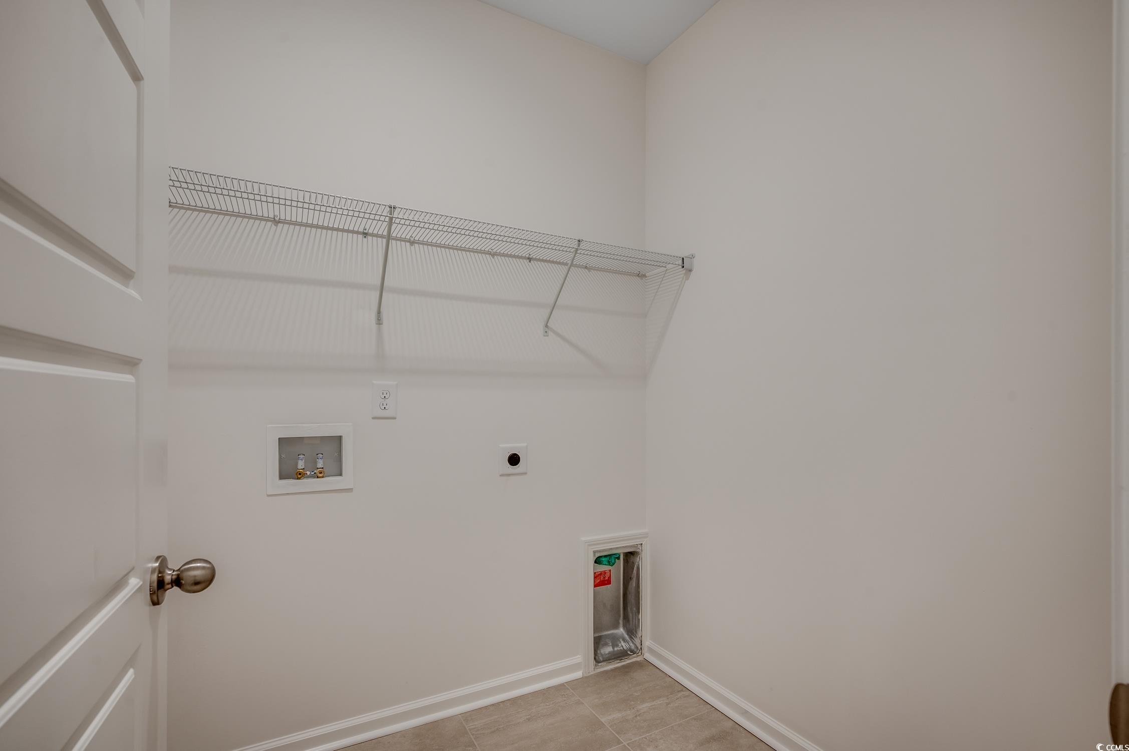4004 Braid Court Myrtle Beach, SC 29588 - Photo 17 of 24 Laundry area featuring light tile patterned flooring, hookup for a washing machine, and electric dryer hookup