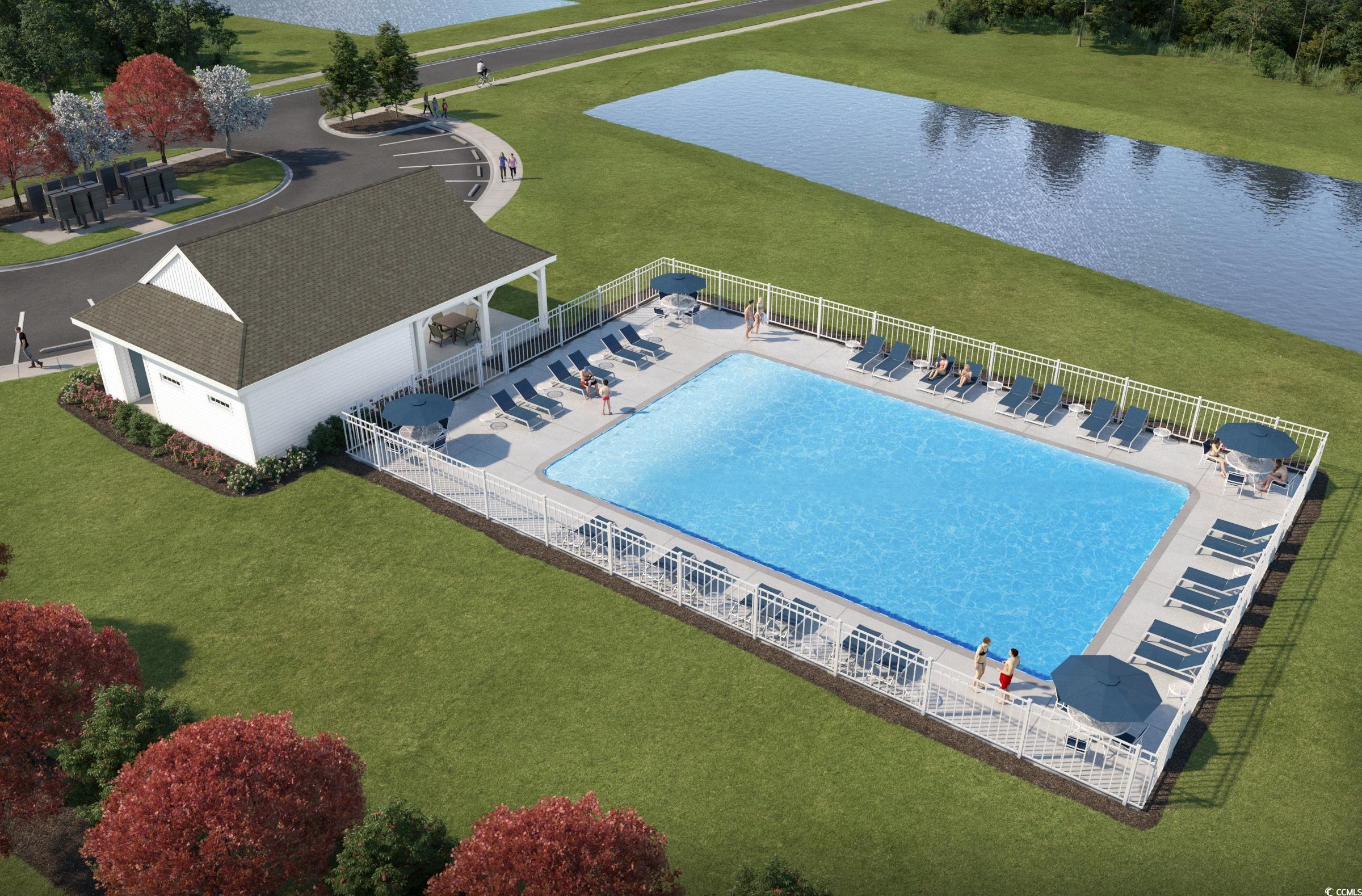 4004 Braid Court Myrtle Beach, SC 29588 - Photo 19 of 24 Aerial view of a pool area and a nearby body of water