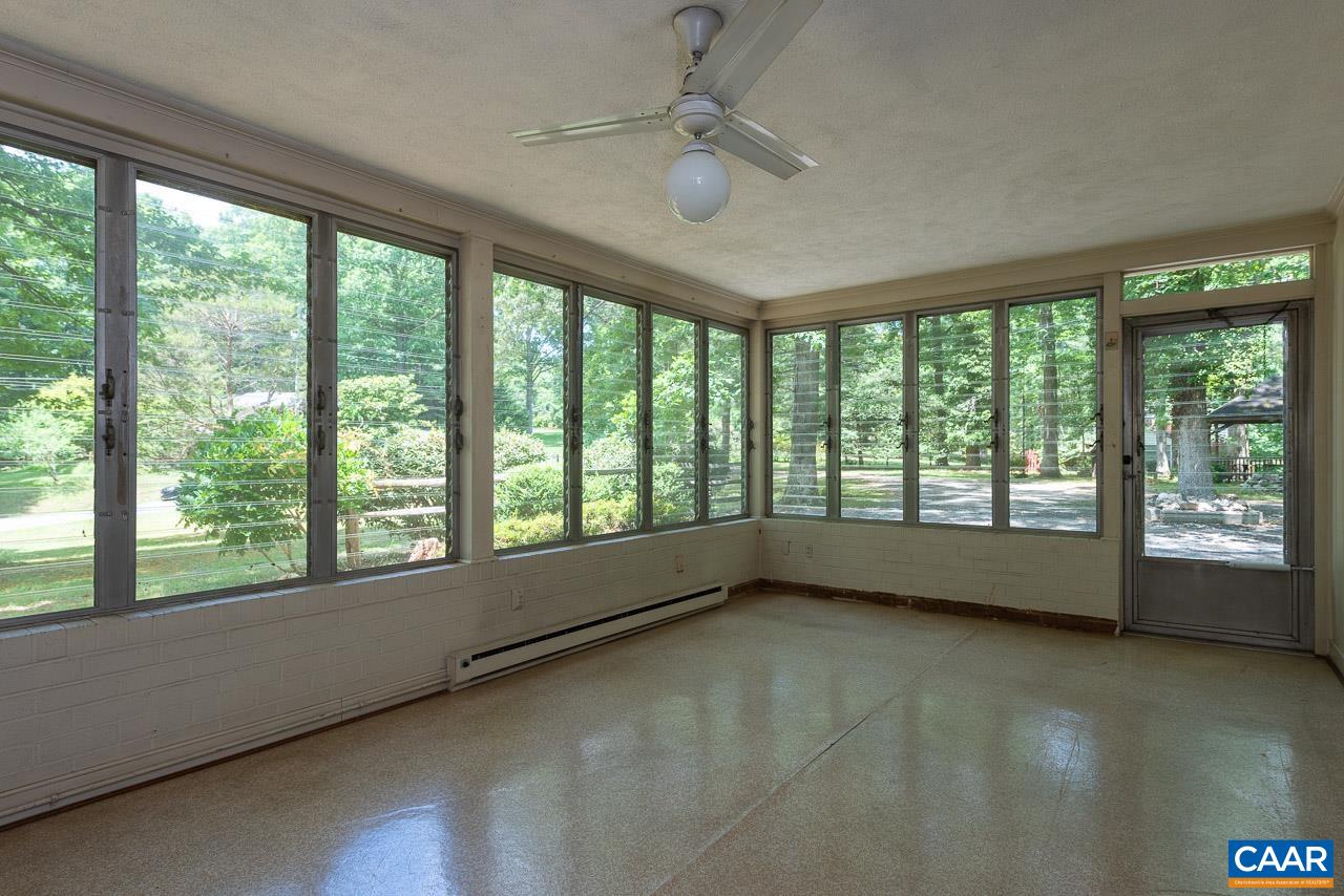 995 Shadwell Road Keswick, VA 22947 - Photo 17 of 23 a view of room with window and a ceiling fan
