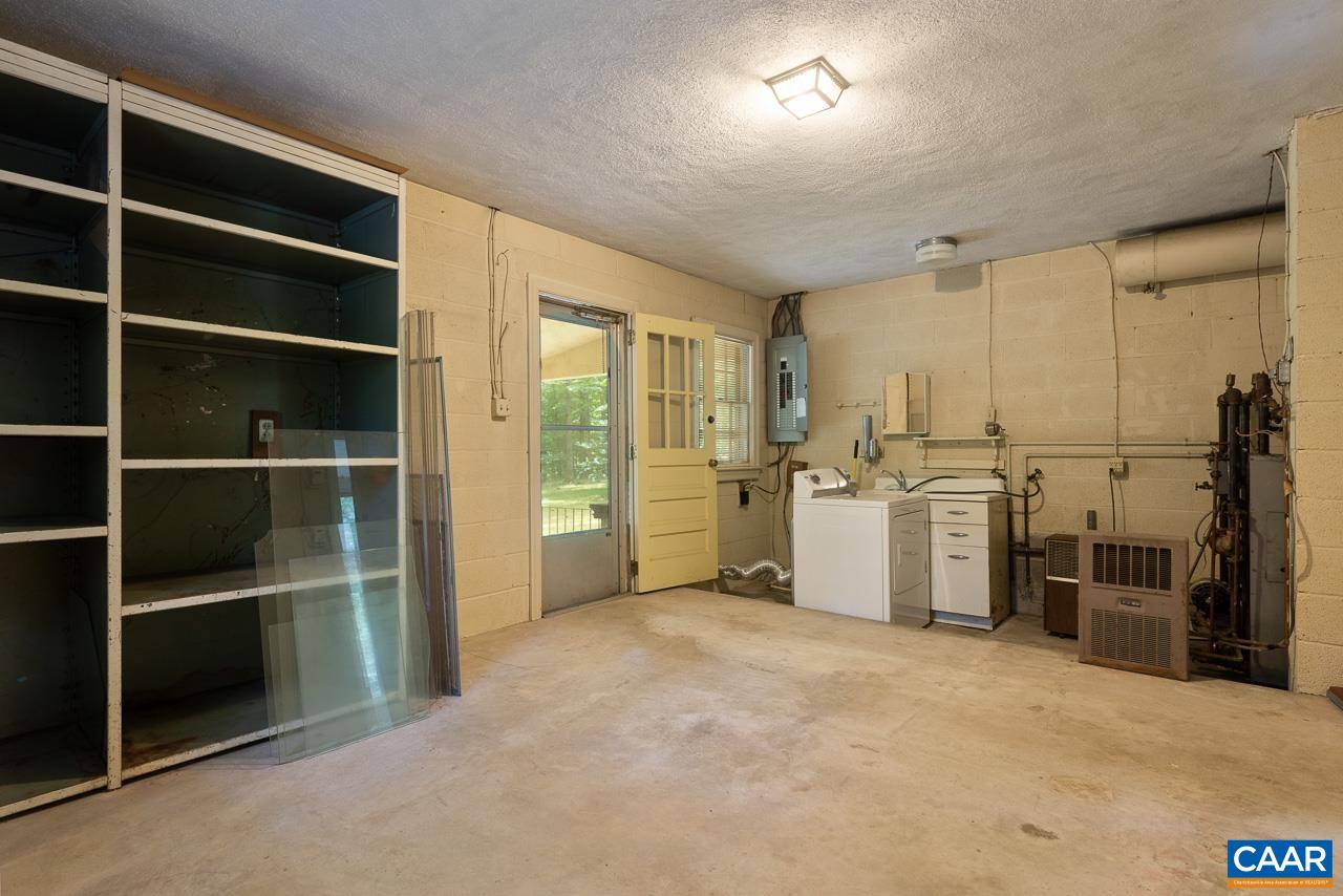 995 Shadwell Road Keswick, VA 22947 - Photo 18 of 23 a view of a kitchen with furniture and a kitchen
