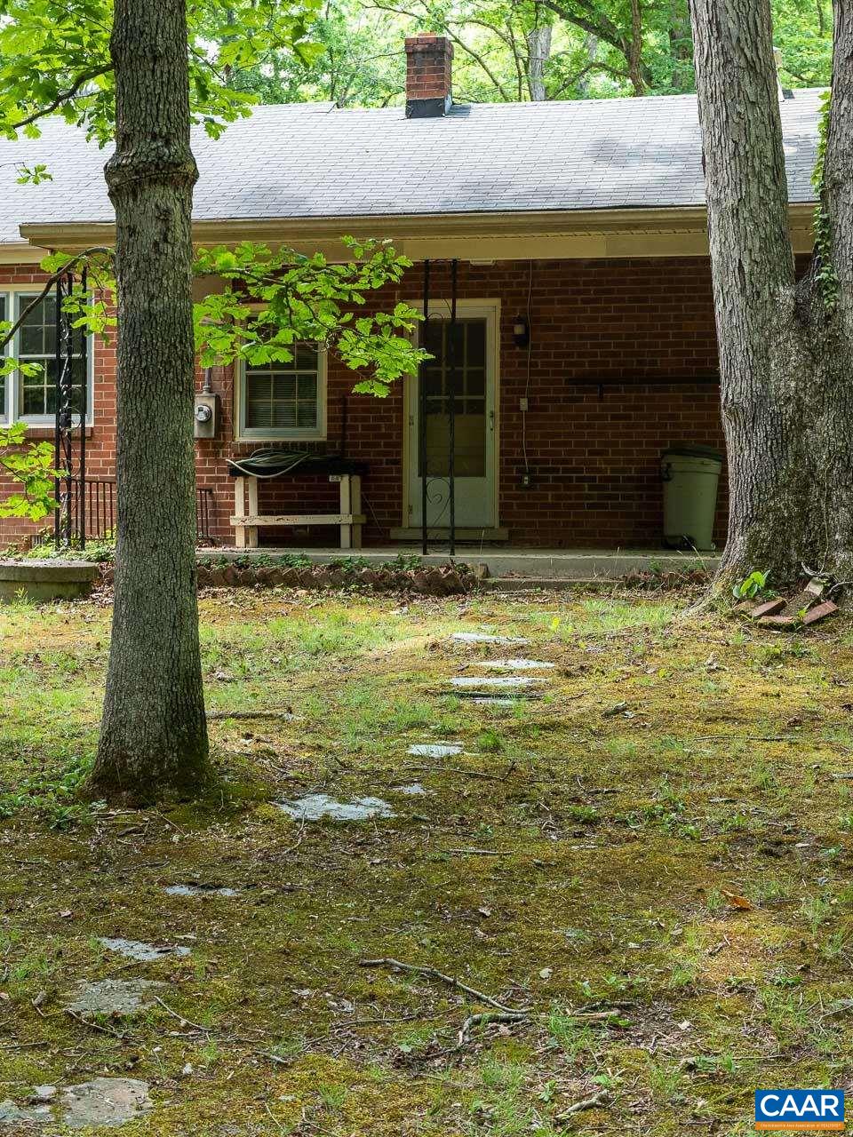 995 Shadwell Road Keswick, VA 22947 - Photo 22 of 23 a view of a couches under an umbrella