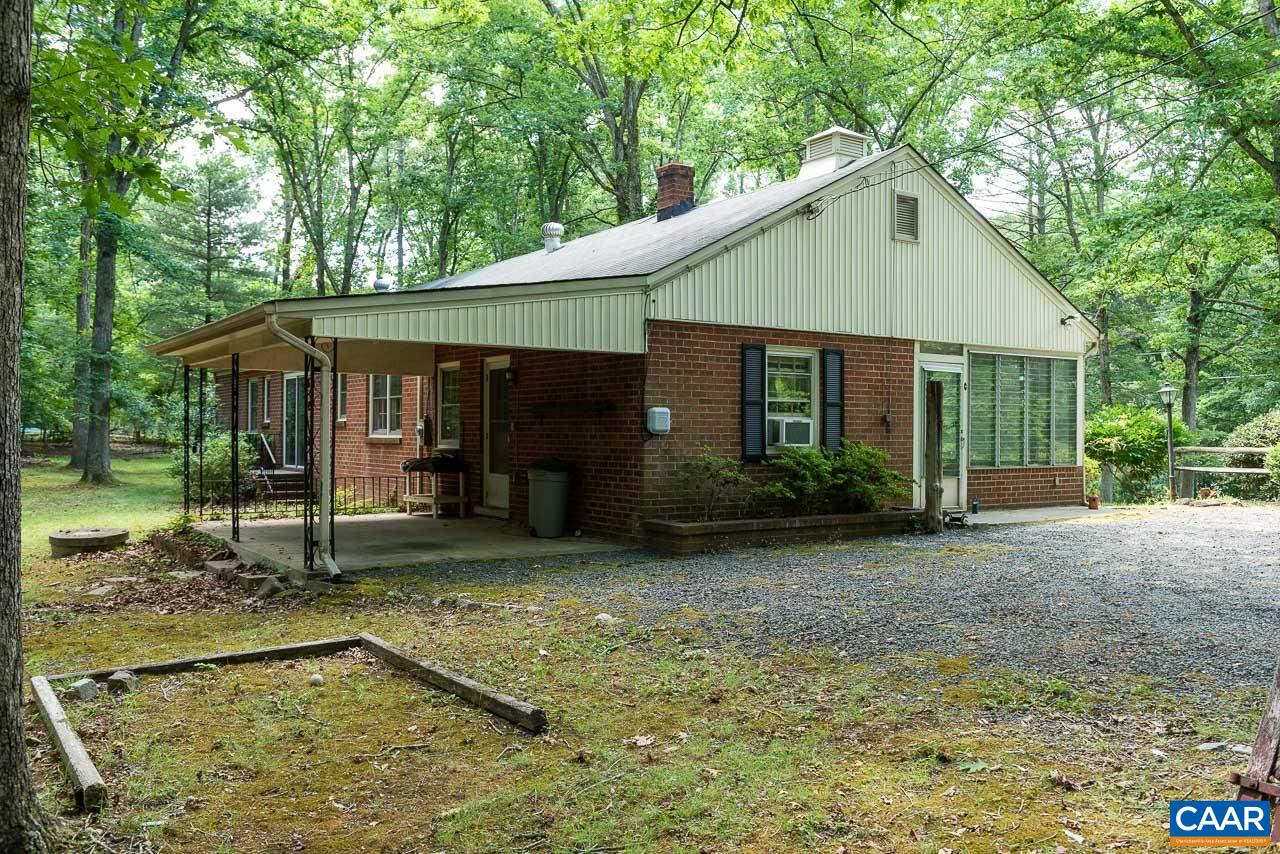 995 Shadwell Road Keswick, VA 22947 - Photo 5 of 23 a front view of a house with a yard