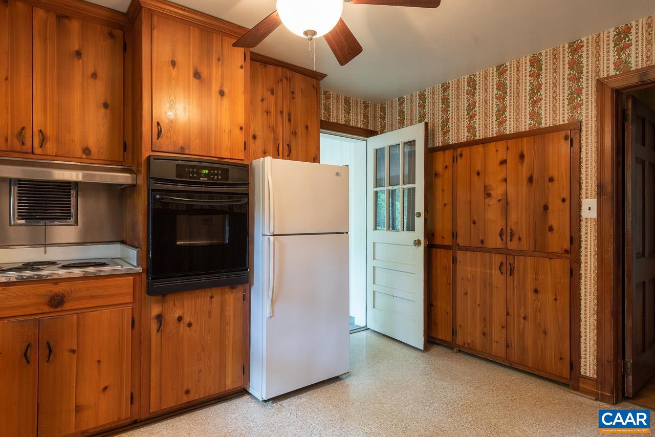 995 Shadwell Road Keswick, VA 22947 - Photo 6 of 23 a kitchen with appliances a washer and dryer
