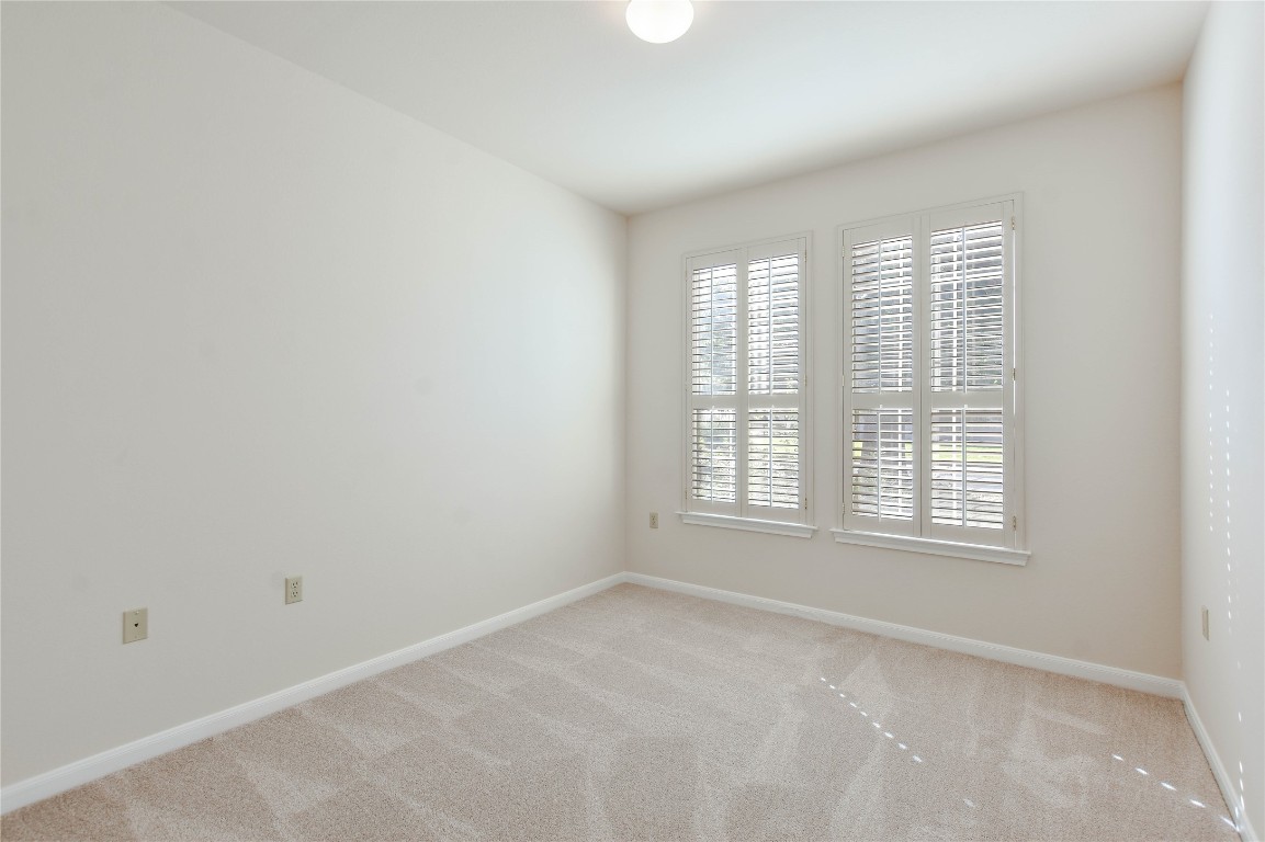 112 Anemone Way Georgetown, TX 78633 - Photo 17 of 40 a view of an empty room with a window