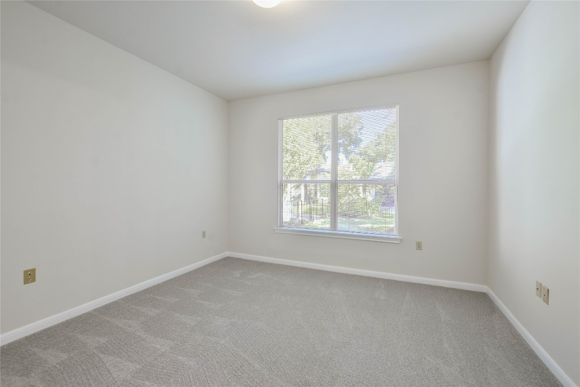 112 Anemone Way Georgetown, TX 78633 - Photo 20 of 40 an empty room with a window