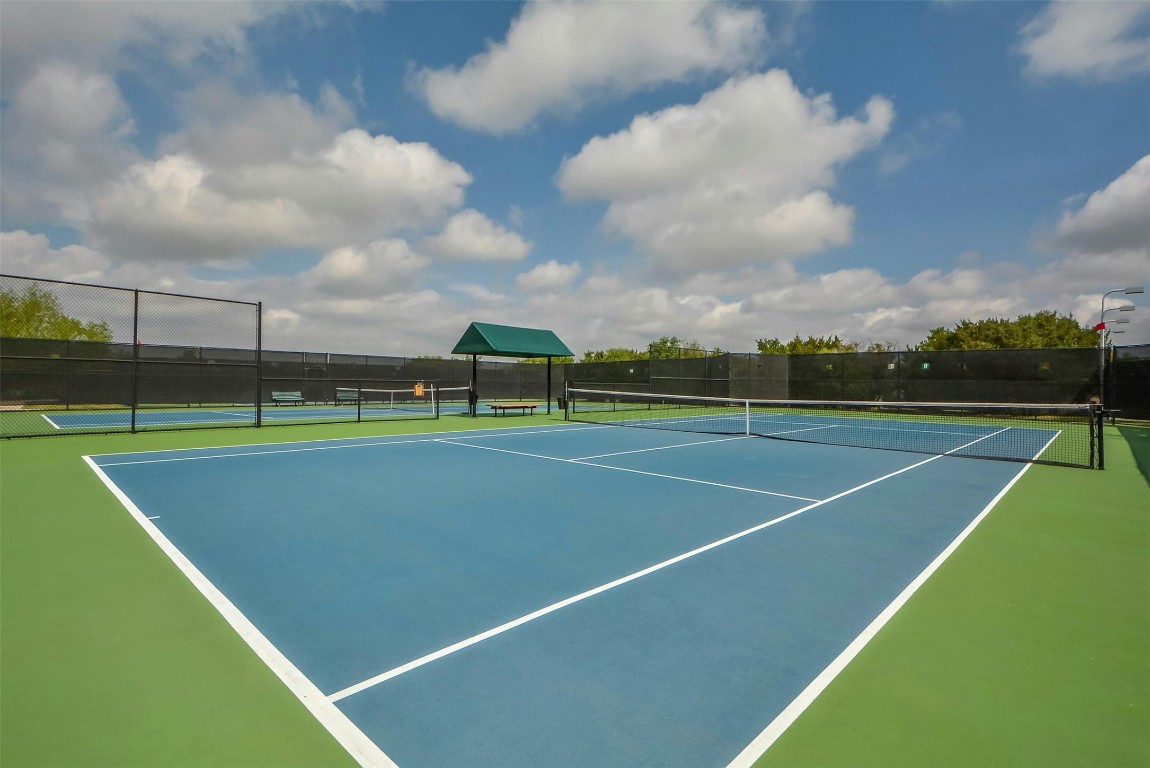 112 Anemone Way Georgetown, TX 78633 - Photo 33 of 40 a view of an outdoor space and tennis court