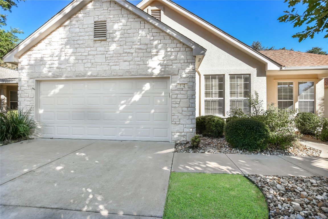 112 Anemone Way Georgetown, TX 78633 - Photo 9 of 40 a front view of a house with a yard