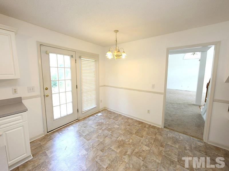 5225 Sutter Way Raleigh, NC 27613 - Photo 5 of 12 a view of livingroom with hardwood floor and window