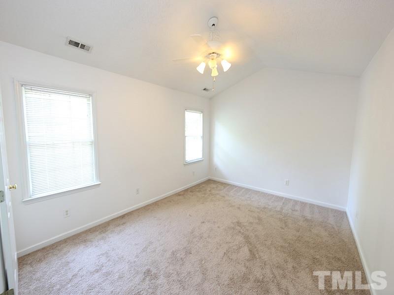 5225 Sutter Way Raleigh, NC 27613 - Photo 6 of 12 wooden floor in an empty room with a window