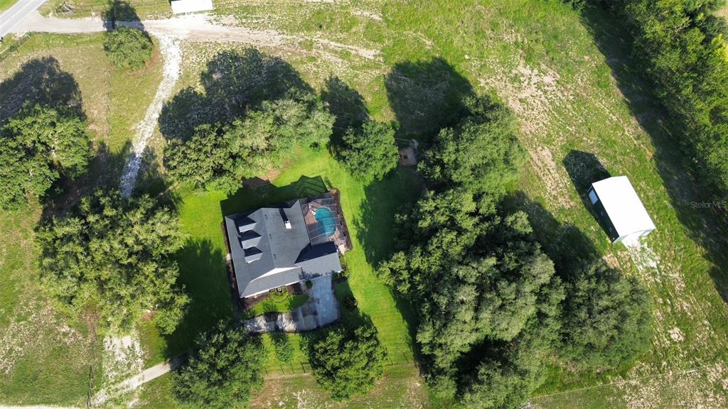 9045 Lake Hatchineha Road Kissimmee, FL 34759 - Photo 45 of 47 an aerial view of a residential houses with yard